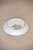 A French ceramic dish with a cobalt blue rim, hand-painted at center with a colorful sailing ship and pennant flags atop...