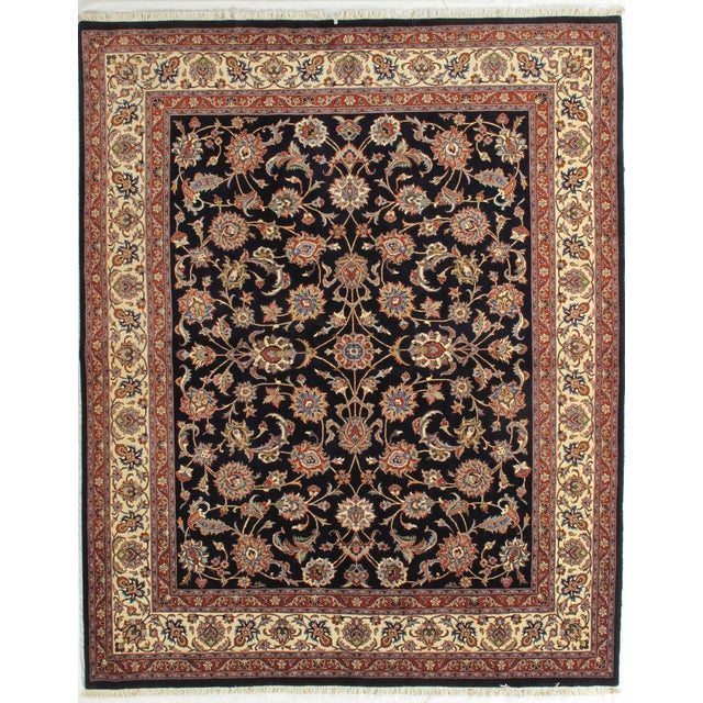 Vintage Hand-knotted Persian Mashad rug from northeastern Iran, known for its durable construction and detailed workshop...