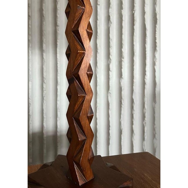 Designer unknown belgium 1960s h 77,5cm ø 25cm a striking vintage table lamp that blurs the line between lighting and...