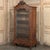 19th Century French Louis XV Serpentine Walnut Display Armoire ~ Bookcase is a magnificent expression of the Rococo style,...