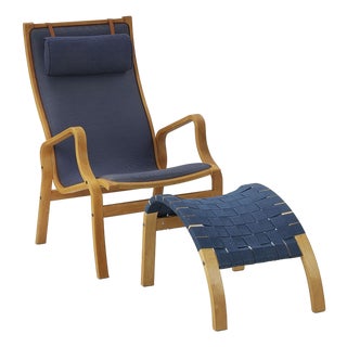 Vintage "Eva" Lounge Chair With Footrest For Sale