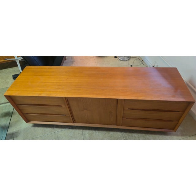 Beautiful wood sideboard by W&J Sloan of NY features 6 drawers and 1 door with 2 shelves inside. Great storage, could be...