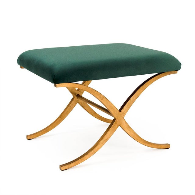 The Amara Bench from Zentique is a glamorous accent stool with a padded emerald green velvet seat atop a sculptural gold-...