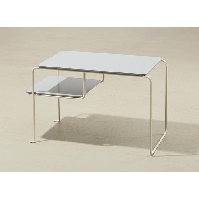 Rare side table, model Beek, designed by Elmar Berkovich in 1956 for 't Spectrum Netherlands. This table is from the early...