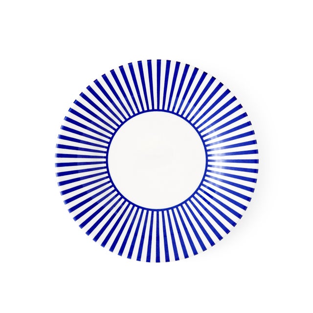 This set of four side plates from Spode's Steccato collection features narrow stripes in a rich cobalt blue shade. The UK-...