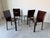 A striking set of four vintage Italian dining chairs crafted in the iconic style of Mario Bellini. These sculptural...