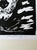 Black-and-white linocut by Hans Krull, dated 2009, depicting an expressive face. Signed and numbered 10/100. Unframed....