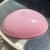 The soft, milky opalescence transitioning into a deep pink hue is characteristic of Venetian opaline or alabastro glass...