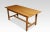 Large kitchen dining refectory table, the large rectangular top above a shallow frieze fitted with two drawers. All raised...