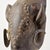 This beautiful ram is smooth and outlined with metal circles down the nose and around the eyes. Among the Baule people of...