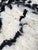 Moroccan Azilal Rug – Handmade Berber Wool Statement Rug This handmade Moroccan Azilal rug features a striking balance of...