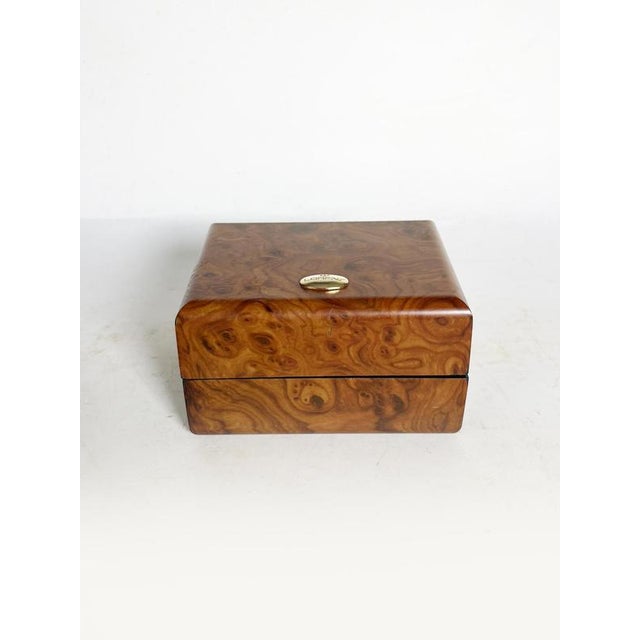 Wooden box, France, 1970s, an elegant vintage piece characterized by a burl wood veneer with particularly decorative...