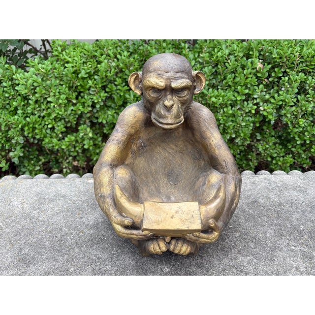 Vintage Bronze Monkey Sculpture. Offered is a beautifully cast seated bronze monkey sculpture with what appears to be a...