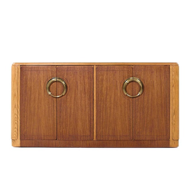 Baker Furniture Deco Revival Walnut and Brass Credenza This credenza measures: 60.25 wide x 16.25 deep x 30.25 inches high...