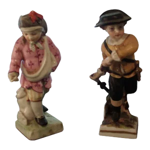 Antique 19th Century Kpm Berlin Porcelain Four Seasons Figures of November and April - a Pair