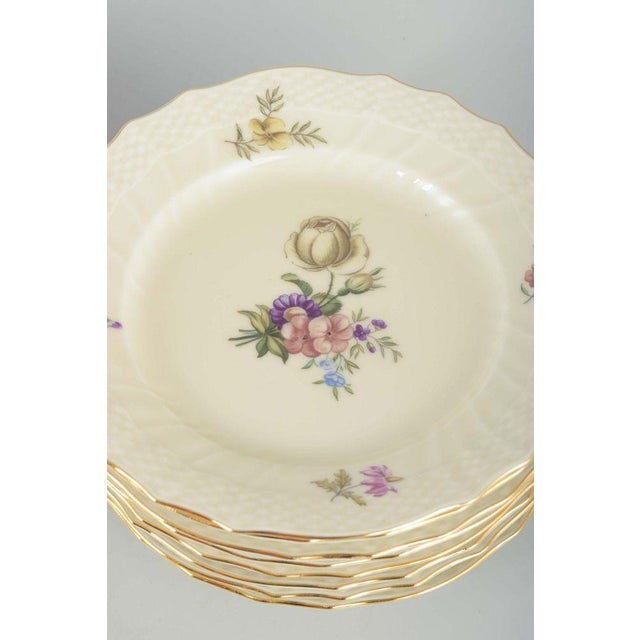 12 Royal Copenhagen Frijsenborg plates Model/decoration: 910/1626 1st quality Mid 20th century Origin: Denmark Designer:...