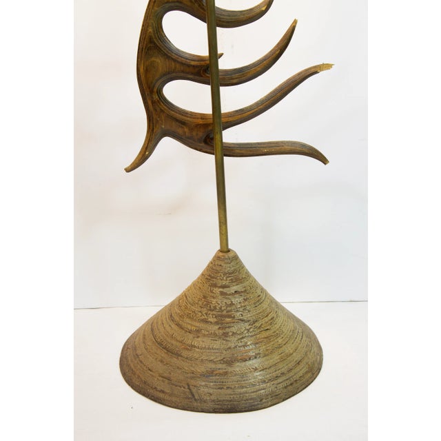 Bird of Paradise? Cockatoo? Phoenix? Stylized carving from exotic wood, perhaps rosewood? Stands an imposing 5 feet tall.