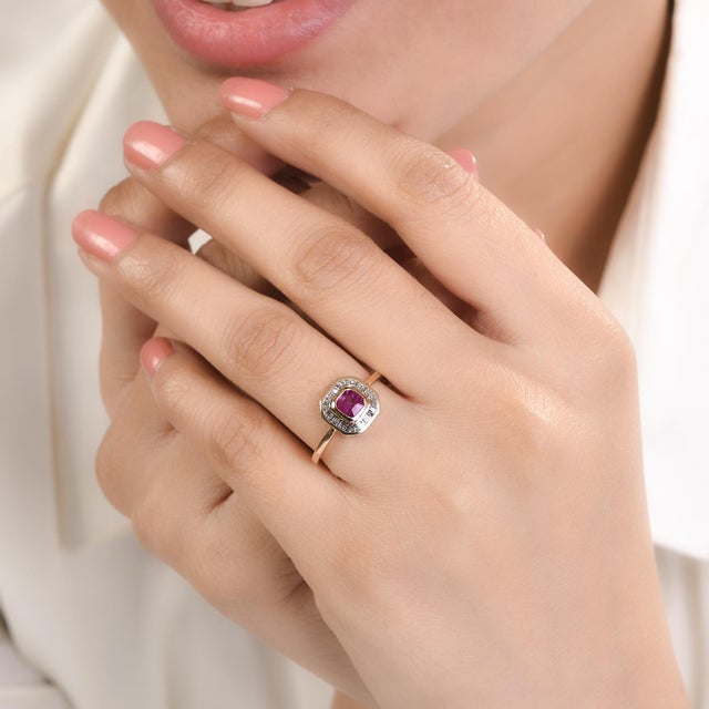 Contemporary Genuine Ruby Diamond Halo Wedding Ring in 14K Gold featuring natural ruby of 0.49 carats and diamonds of 0.24...