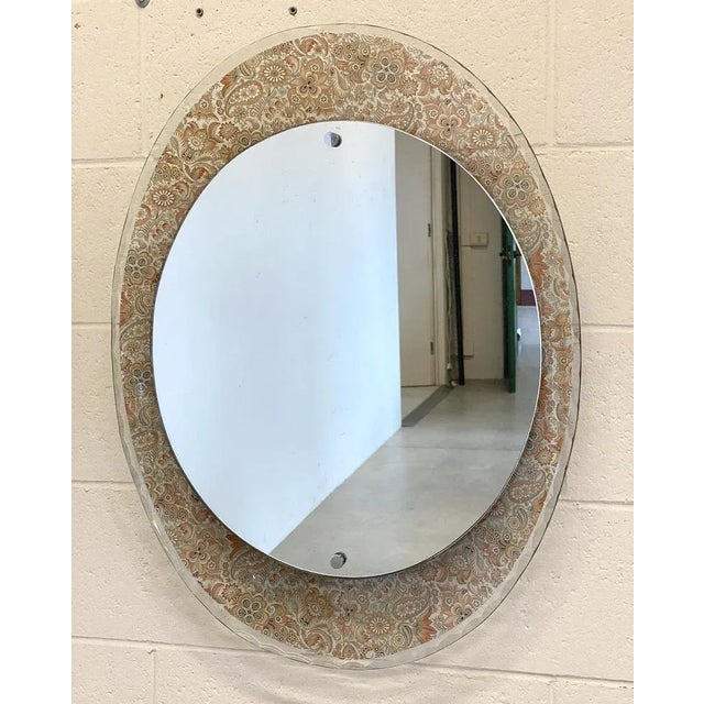 90s oval mirror with buffed glass border with floral stencil