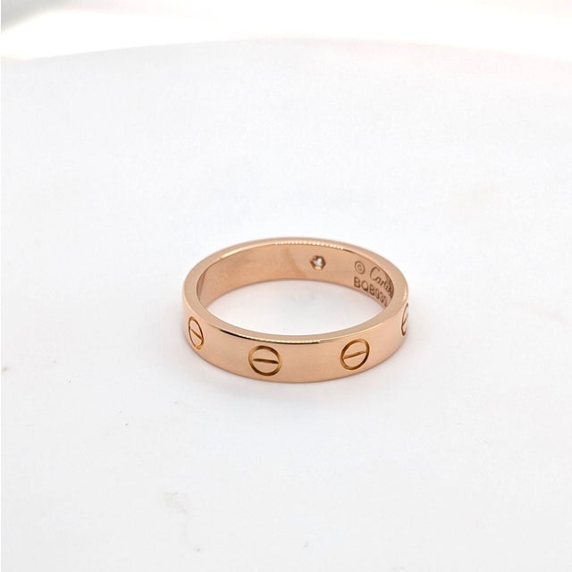 Early 21st Century Cartier "Love" Ring With a Single Diamond in 18k Rose Gold - Size 6.75 For Sale - Image 5 of 10