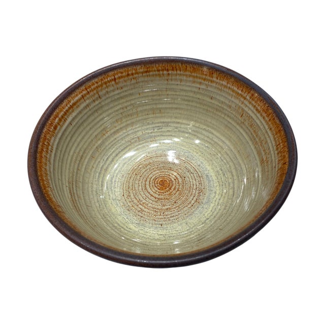 This is a beautiful studio pottery bowl by Mishi Nojima (1916–2011), a Berkeley-based artist active primarily in the...
