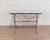 A distinctive nineteenth-century French wrought iron table, showcasing exceptional craftsmanship and a richly aged...