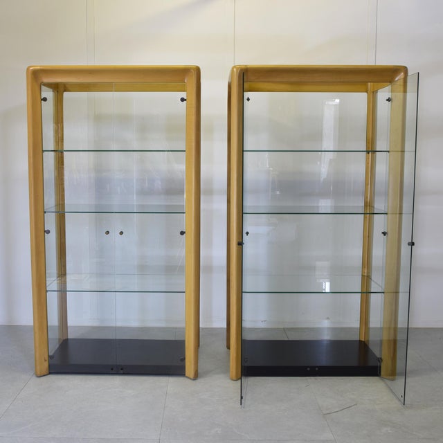 Showcase with beech wood structure with walls, doors and shelves in glass, De Nos series, produced by designer Angelo...