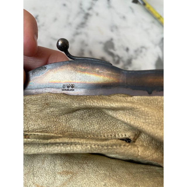 A rare stunning silver plate chain and highly detailed frame.