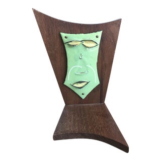 Vintage Mid Century/ Hollywood Regency Wood and Enamel Abstract Face Bookend For Sale