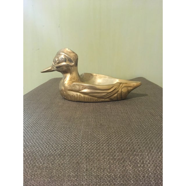 Vintage solid brass wood duck ashtray. Heavy, bright and shiny classic piece.