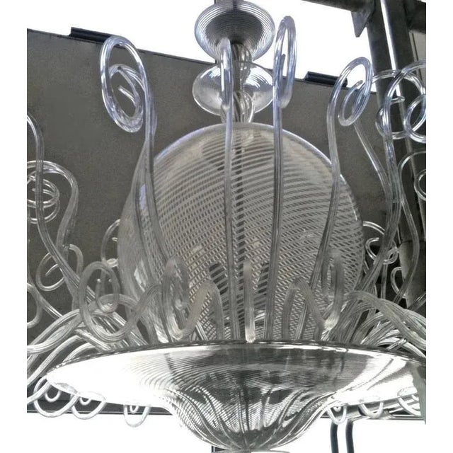 Very rare Venetian Murano glass chandelier of aquatic marine inspiration worked with an amazing white Filigrana...