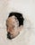 In "Social Media Blues," an abstracted visage emerges from a soft, muted background, evoking a sense of introspection and...
