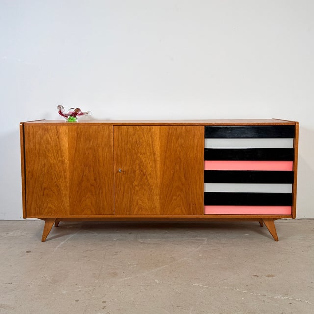 Sideboard U460 from 1965, designed by Jiří Jiroutek and produced by the Czech company Interier Praha. with its...