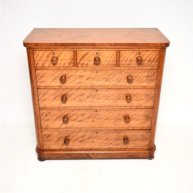 A very impressive large antique Victorian satin wood chest of drawers. This was made in England, it dates from around the...