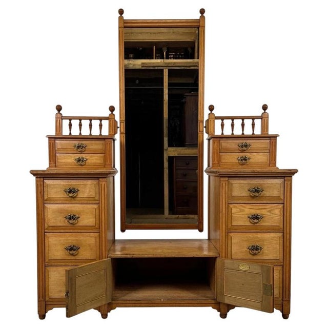 A substantial and exceptionally well-crafted 19th-century english dressing chest by t. Simpson & sons, constructed from...