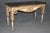 This striking Greek key–carved console table is one of those pieces that feels quietly architectural the moment it’s...