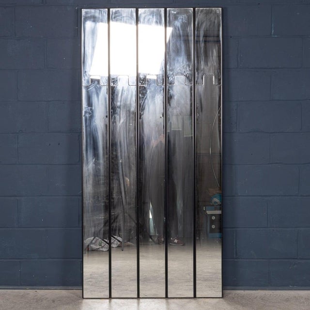 A modular “gronda” mirror coat rack designed by luciano bertoncini for elco in the 1970s. The composition includes five...