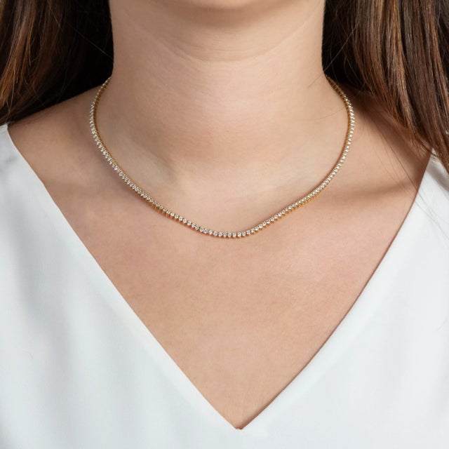 5 carats of diamonds beautifully set in 14K gold. Honestly, our quality makes this stand apart from all the other tennis...