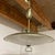 Vintage 1950s–60s Mid-Century Modern pull-down saucer pendant light. Features an 18" perforated brass/gold-tone metal...