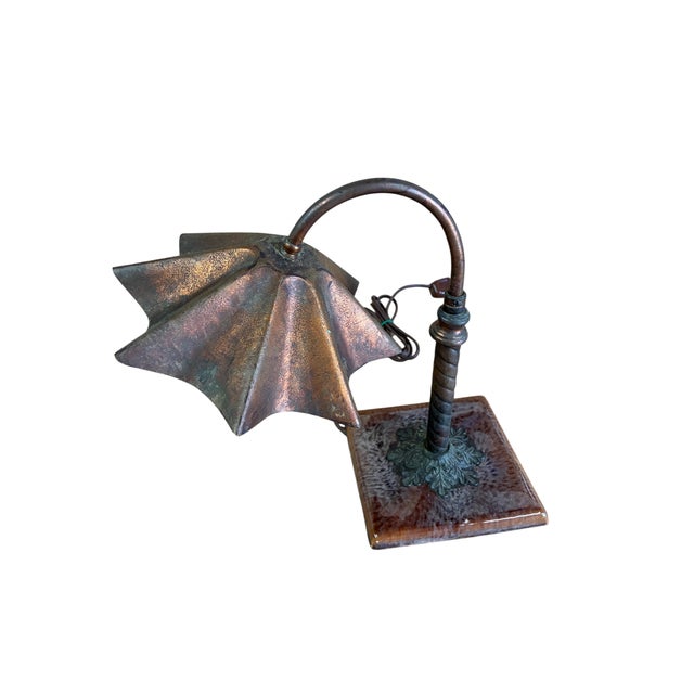 Beautiful arts and craft desk lamp. Lamp is working but with all vintage lighting we suggest you have it looked over by a...