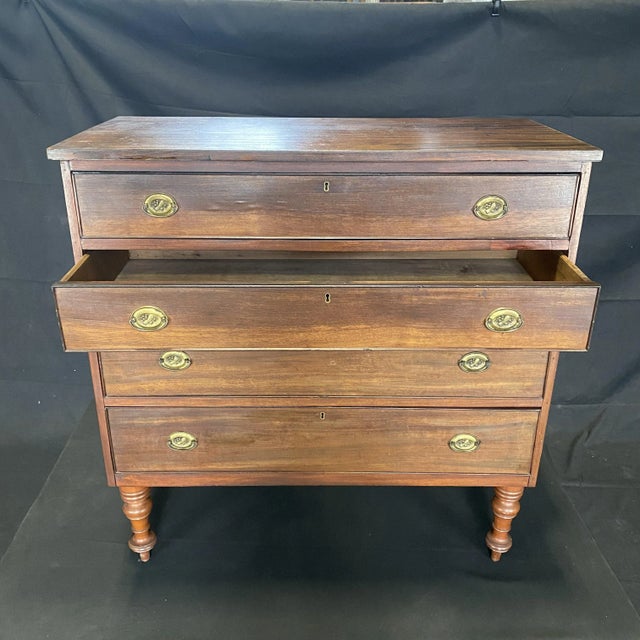 American Sheraton mahogany chest with four cock beaded drawers with original wheat sheaf, fruit and oval floral brasses...