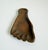 A vintage, circa 1960s, copper metal foot catchall or ashtray. It features a stylized, anatomical human foot shape with...