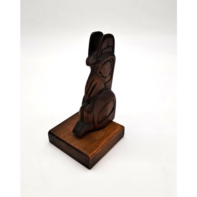 A beautifully hand-carved wood sculpture by the well-documented and collected Coast Salish artist Joe Becker (1943–2014)...