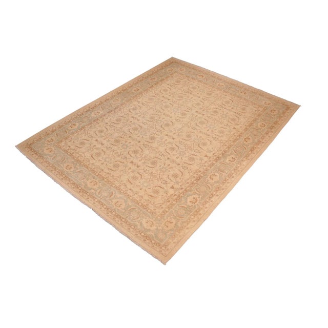 "Enhance the ambiance of your home with this magnificent Persian-influenced Turkish hand-knotted rug made by skilled...