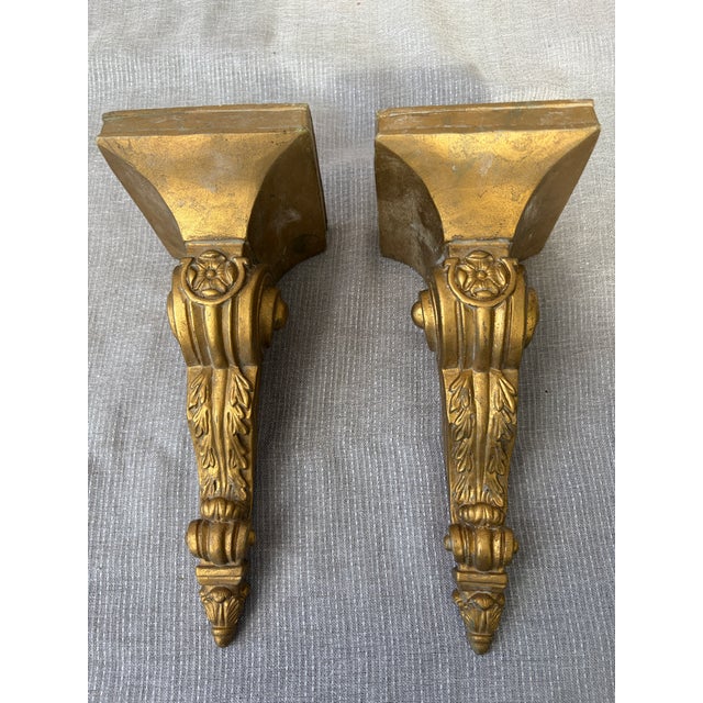 Vintage set of gold resin candleholder sconces. They have a subtle gold rubbed finish. Two drilled holes in the back for...
