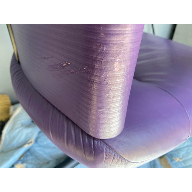 The 1990s Mario Bellini Vitra Figura Post Modern Purple Leather Desk Chair is a luxurious and stylish addition to any...