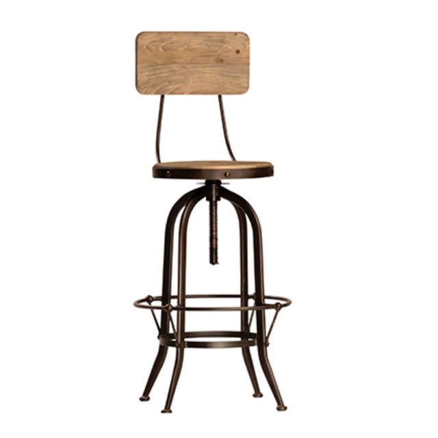 Industrial farmhouse style iron and salvaged natural wood stool that adjusts up or down for the perfect height. Perfect...