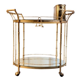 Mid 20th Century Faux Bamboo Rattan Brass Rolling Oval Two-Tier Bar Cart For Sale