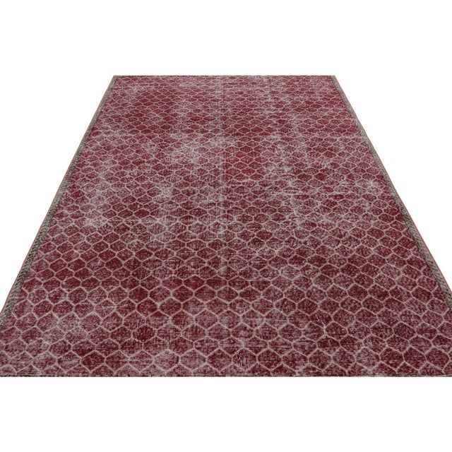 Hand Knotted in wool circa 1960-1970, this 7x9 vintage Turkish rug is believed to be among the rare works of mid-century...