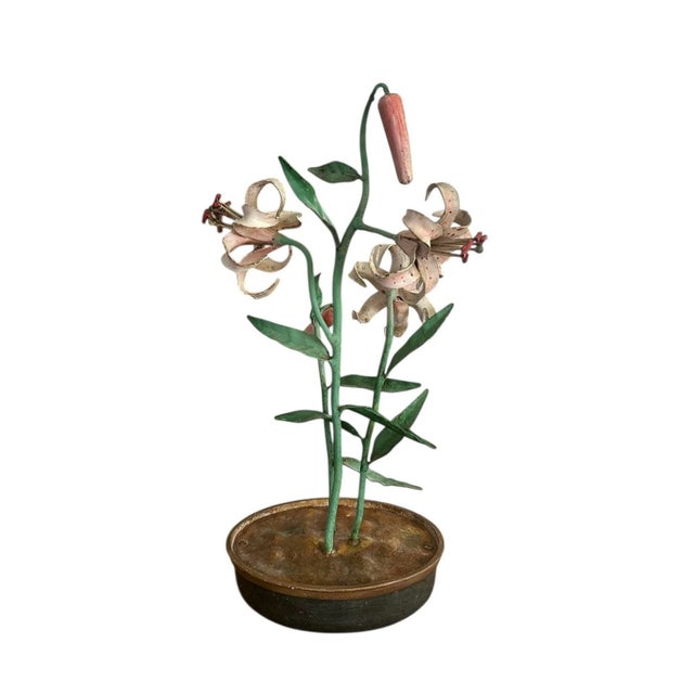 A charming, vintage tole floral arrangement. Features a grouping of three pink, blooming lilies accompanied by three...